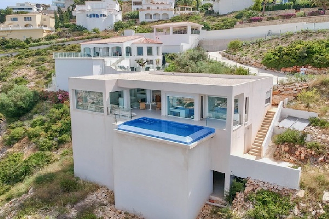 Villa in Benitachell(La Cumbre del Sol) te koop, woonoppervlakte 140 m², Airconditioning, grondstuk 1395 m², 2 slapkamer, 2 badkamer, Zwembad, ref.: CA-H-1815-AMB-1